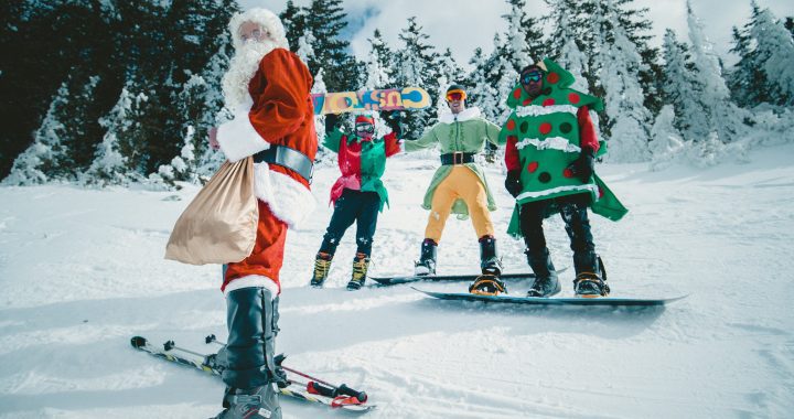 Skiing in Christmas costumes for a lift ticket discount.